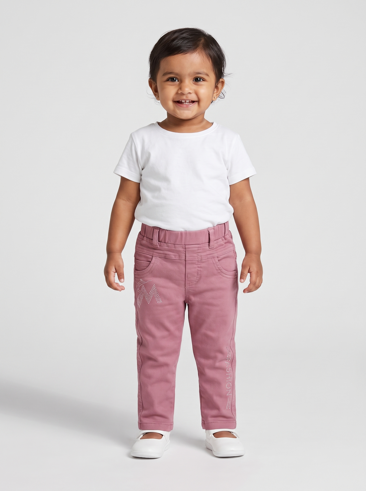 Front view of dusty pink cotton denim pants for baby girls